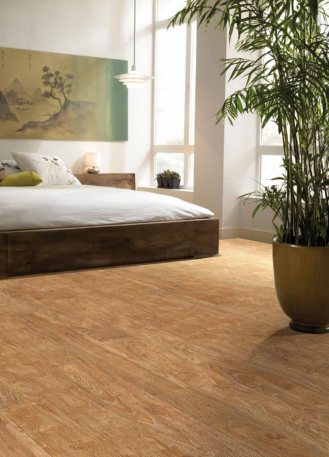 Laminate Flooring by Shaw in Bedroom with wood-look design.