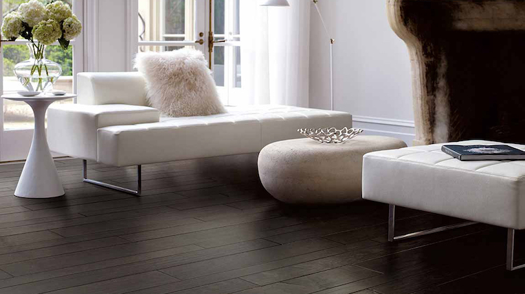 dark stained hardwood floors in an elegant living room
