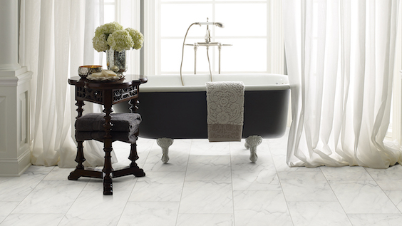 marbled tile flooring in a classy white bathroom